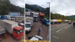 Dezenas de caminhões ficam parados às margens da ponte do Rio Maranduba, em Ubatuba; VÍDEO