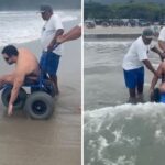 'Me senti livre': médico entra no mar pela primeira vez após perder visão e perna em acidente